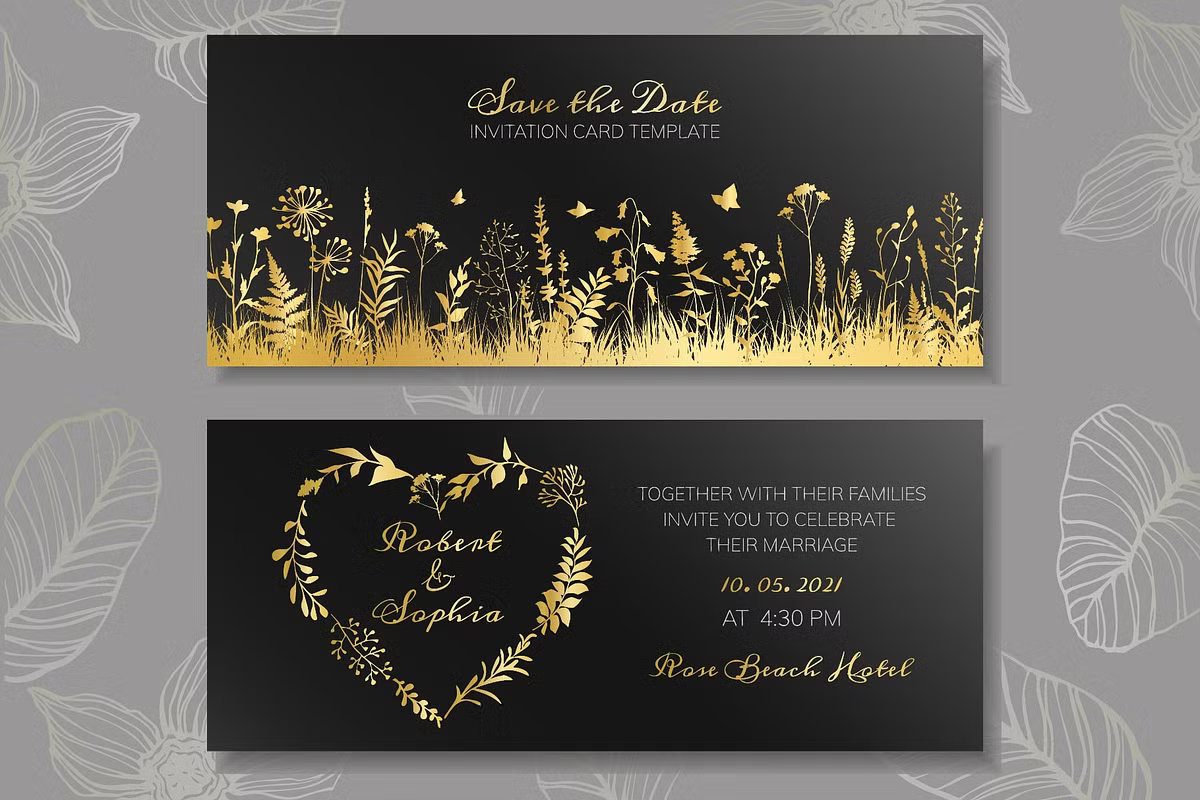 Black wedding invitation with golden wildflower illustrations and elegant script.