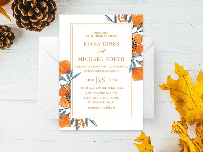 terracotta orange floral wedding invitation with warm botanical design